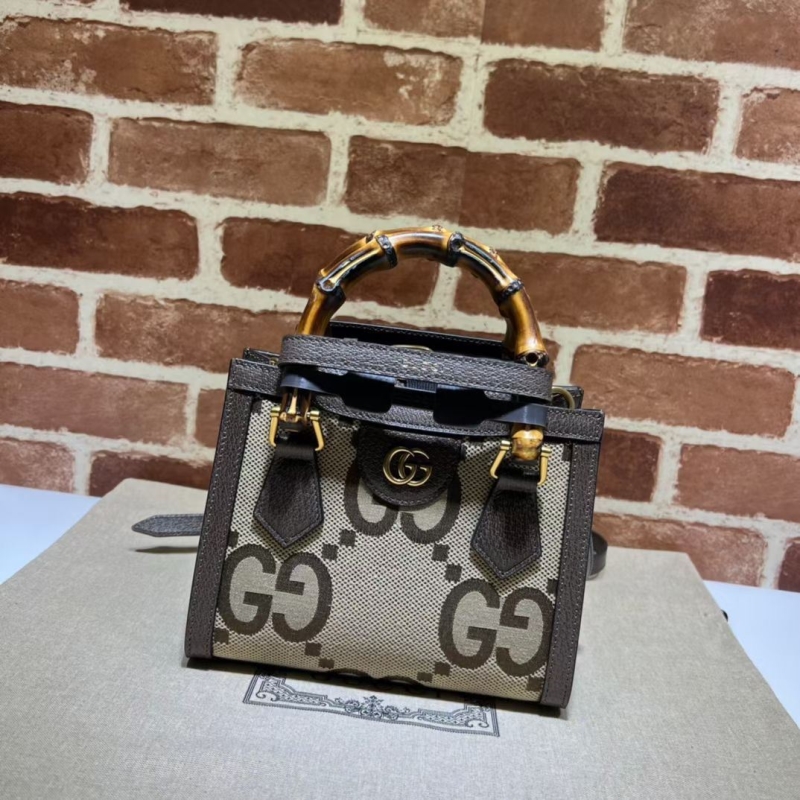 G*u*i top handle bags